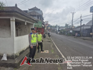 Polsek Pupuan Laksanakan Strong Point untuk Ciptakan Kamtibcar Lantas yang Kondusif