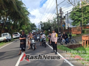 Bhabinkamtibmas Desa Marga Pengamanan Upacara Ngaben
