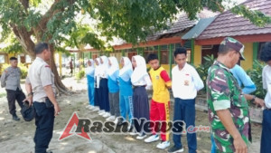 Dedikasi Babinsa Sertu Ibrahim dan Serda Abdul Hafid Membentuk Generasi Paskibra Berkualitas