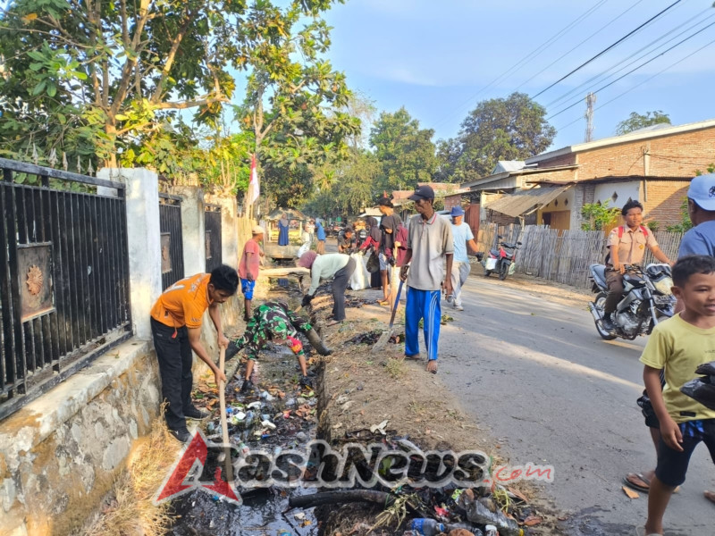 Warga dan Aparat Woha Bersatu Ciptakan Desa Risa yang Bersih dan Rapi