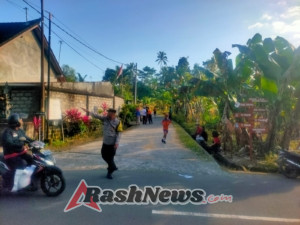 Bhabinkamtibmas Desa Marga Dauh Puri Pengamanan Lomba Lari Menyambut HUT RI Ke 80