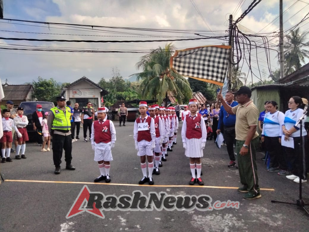 Memperingati HUT RI Ke 80, Personil Polsek Manggis Melaksanakan Pengamanan Kegiatan Lomba Gerak Jalan Tingkat SD Sekecamatan Manggis.