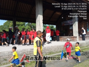 Ciptakan Situasi Kondusif Bhabinkamtibmas Desa Payangan Pengamanan Gerak Jalan Santai Menyambut HUT RI Ke 80