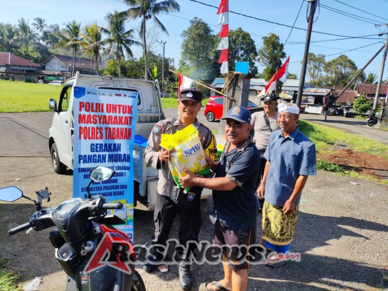 Bhabinkamtibmas Desa Pajahan Salurkan Bantuan Pangan Beras Murah SPHP kepada Warga Pajahan