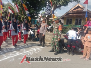 Lomba Gerak Jalan di Seteluk Berjalan Lancar Berkat Dukungan Pengamanan Babinsa