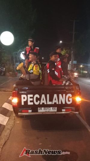 Bhabinkamtibmas Bersinergi dengan Pecalang, Gelar Patroli Wilayah Antisipasi Maybank Marathon 2025