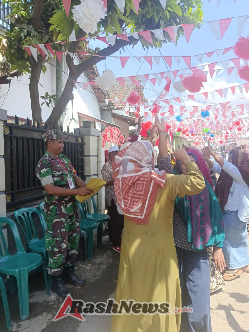 Babinsa Serda Zikrullah Muslim Hadirkan Semangat Gotong Royong Dalam Lomba Dusun