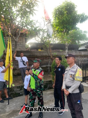 TNI Hadir di Tengah Masyarakat, Babinsa Kawal Jalan Sehat Berhadiah di Banjar Dlod Rurung