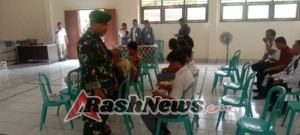 Babinsa Banyuning Hadirkan Rasa Aman dalam Penyerahan Paket MBG di SMK TI Global Bali