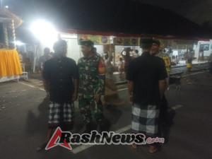 Dukung Kelancaran Hari Suci Tumpek Landep, Babinsa dan Bhabinkamtibmas Kawal Prosesi Adat di Petemon