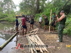 Satgas TMMD dan Warga Benteng Tawa Kompak di Lokasi Rehab Bendungan Panondiwal