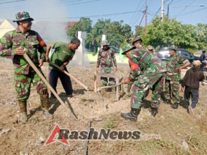 Dukung Program Pemerintah, Koramil 1608-04/Woha Kerja Bakti Bersihkan Lahan Pembangunan Koperasi Merah Putih