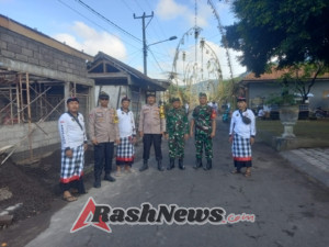 Babinsa 1623-05/Manggis bersama Bhabinkamtibmas amankan upacara keagamaan.