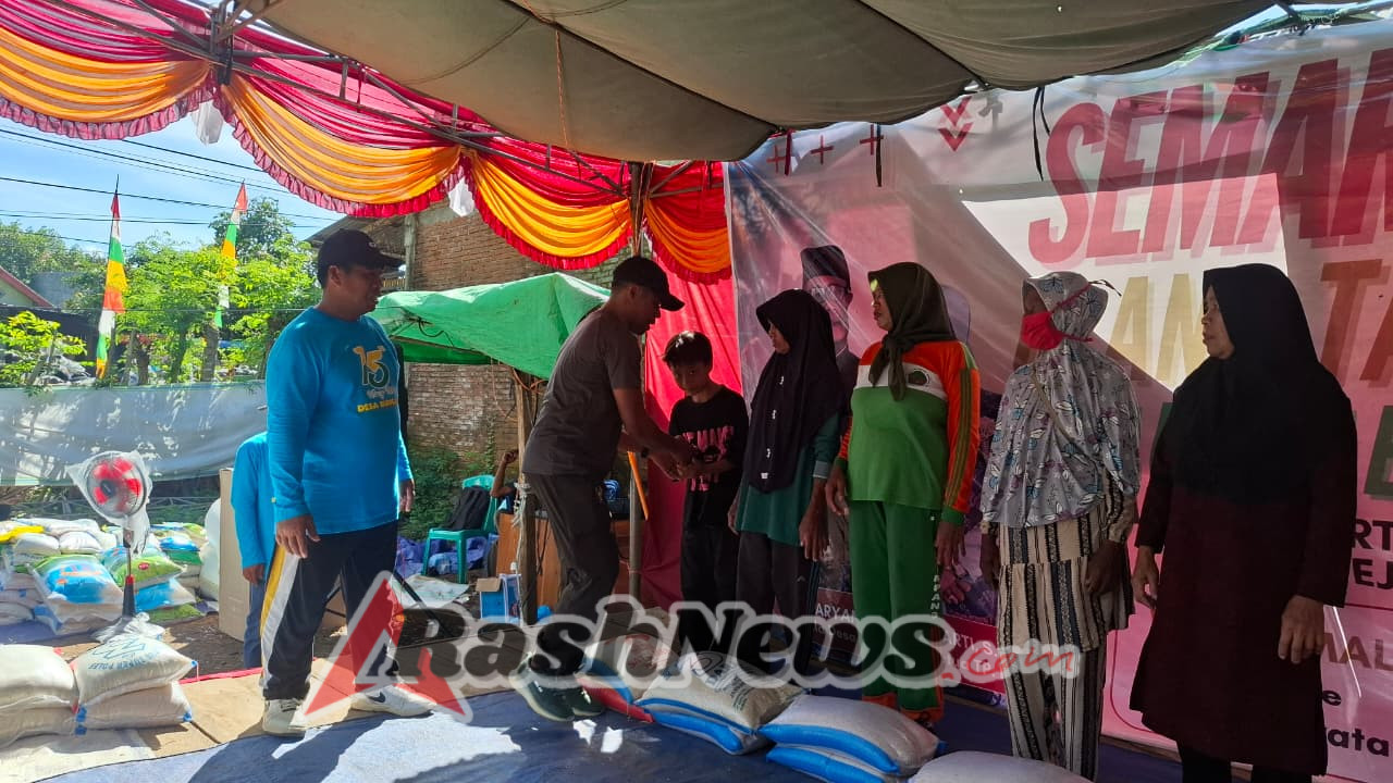 Babinsa Bunga Eja Meriahkan Jalan Santai HUT Desa ke-15