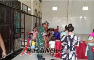 Perhatian TNI pada Kesehatan Warga, Babinsa Peninjoan Terjun Langsung Dampingi Kegiatan Posyandu Balita