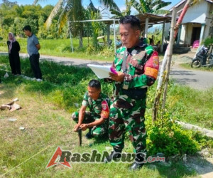Babinsa Jajaran Kodim 1620/Loteng Kawal Pengukuran Lahan Lokasi Pembangunan Koperasi Merah Putih