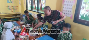Babinsa Koramil Kupang Bantu Anak TK Nikmati MBG