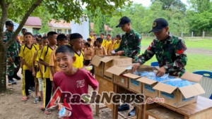 Satgas Pos Maubusa Bagikan Bekal Gratis kepada Siswa SDK Wesoer