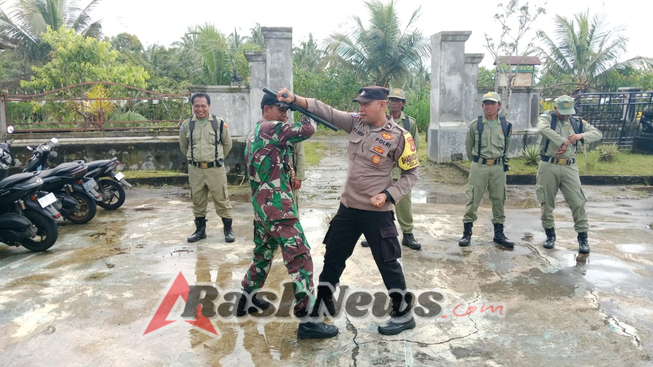 Bhabinkamtibmas Desa Lumbung Laksanakan Giat Pembinaan Dan Pelatihan Anggota Linmas