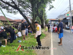 Babinkamtibmas Desa Banjar Anyar Melaksanakan Pengamanan Lomba Mancing di Saluran Irigasi BTN Sanggulan