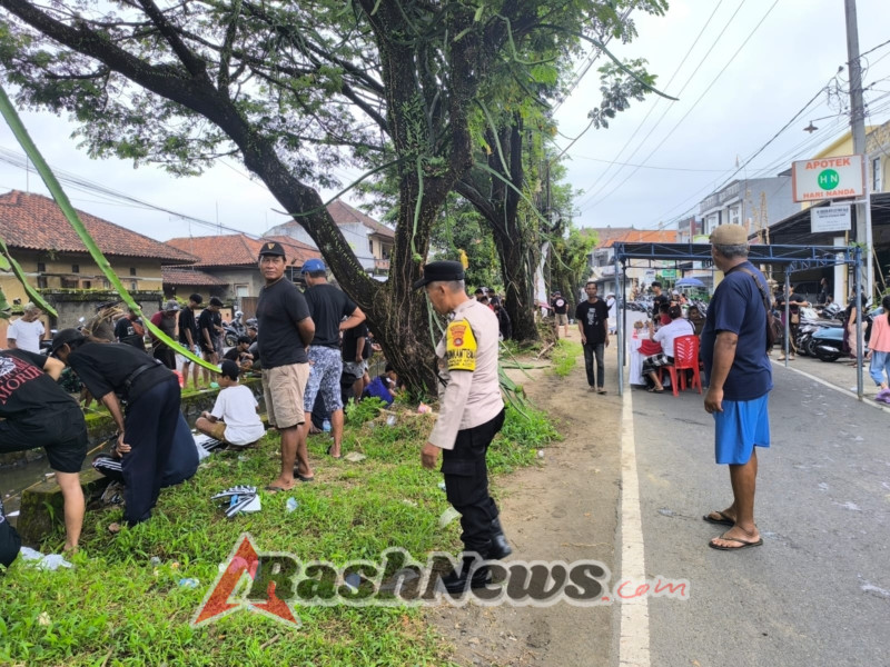 Babinkamtibmas Desa Banjar Anyar Melaksanakan Pengamanan Lomba Mancing di Saluran Irigasi BTN Sanggulan