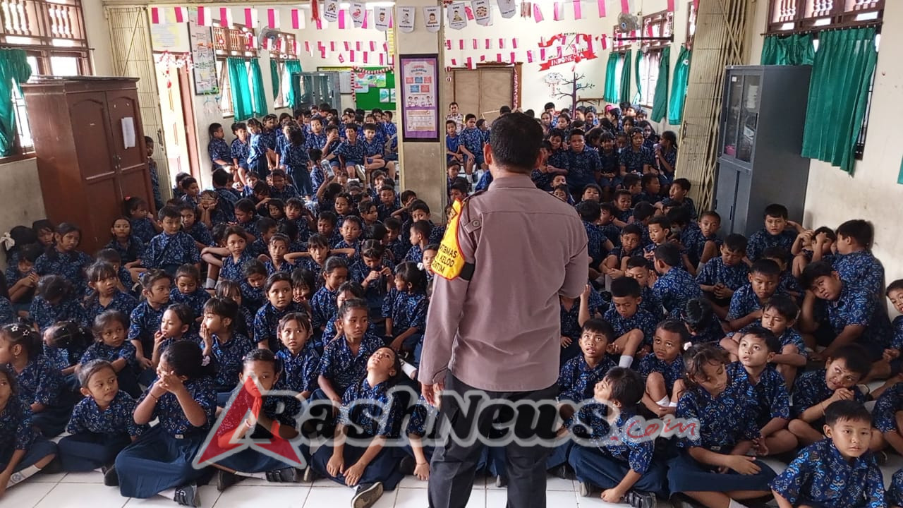 Unit Binmas Polsek Dentim Edukasi Siswa SD Negeri 12 Kesiman tentang Bahaya Bullying dan Keselamatan Berlalu Lintas