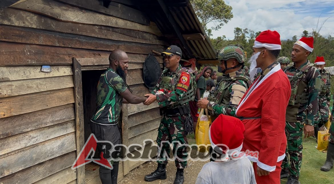 Sambut Bahagia Kasih Natal Satgas Yonif 743/PSY Hadirkan Damai di kampung Tirineri Papua