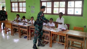 Yonarmed 12 Kostrad Tanamkan Nasionalisme Siswa Perbatasan Melalui Gadik Pos Dafala