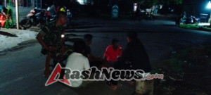 Babinsa Sertu Junaidin Perkuat Keamanan Wilayah Lewat Patroli Malam