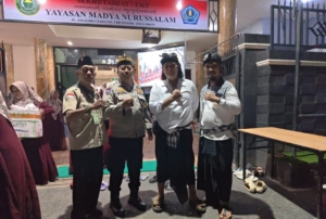 Bhabinkamtibmas Bersama Pecalang Amankan Peringatan Isra’ Mi’Raj di Yayasan Nurussalam