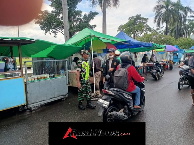Cuaca Hujan Tidak Menghalangi Pengamanan Pasar Ramadhan di Jalan Flores Sarae