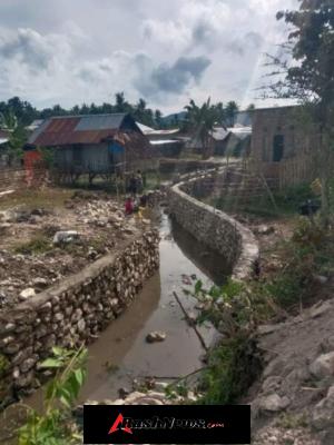 Progres Pembangunan Talud Desa Tolouwi Capai 63 Persen