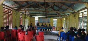 Wujud Kepedulian, Babinsa Lewa Hadiri Rapat Rumah Desa Sehat