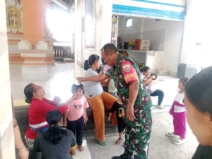 Posyandu Balita Berjalan Lancar, Babinsa Peninjoan Turut Pastikan Kesehatan Anak Terjaga