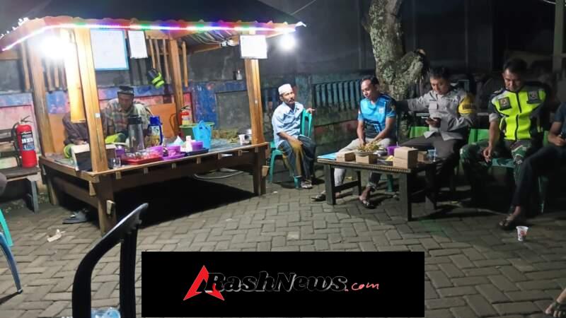 Sinergitas TNI-Polri, Penilaian Poskamling di Desa Moteng Berjalan Lancar
