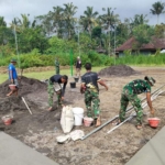 Progres pembangunan lapangan voly Satgas TMMD ke – 128 Kodim 1623/Karangasem sudah mencapai 80 persen