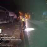 Sinergitas Tanpa Batas: Polri dan Pecalang Amankan Perbaikan Infrastruktur Telkom di Bebandem