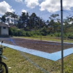 Satgas TMMD ke 128 Kodim 1623/Karangasem bersinergi dengan masyarakat membangun lapangan voli di Desa Pempatan