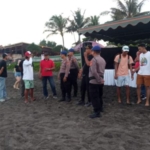 Pengamanan Kontes Surfing Joymood di pantai Pig Stone di Banjar Langudu