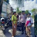 Sinergi Bhabinkamtibmas dan Babinsa Amankan Rangkaian Upacara Pitra Yadnya di Desa Adat Negari