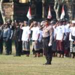 Jaga Semangat Nasionalisme, PS. Wakapolsek Abiansemal Pimpin Upacara Penurunan Bendera HUT RI Ke-81